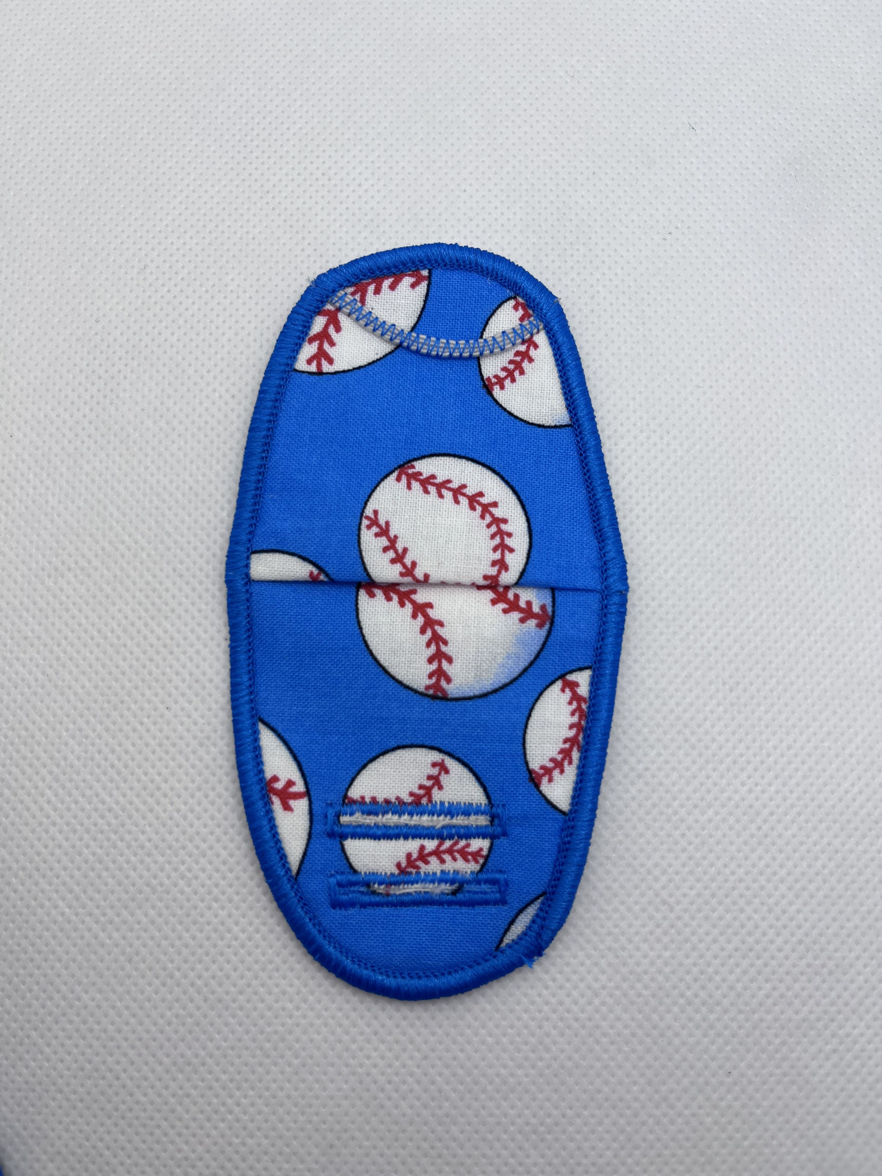 Baseballs on Blue Plastic