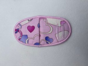 Eye patch, pink and purple hearts, metal