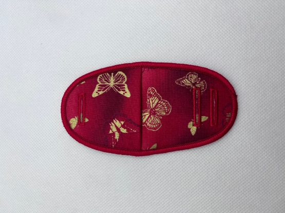 Eye patch, gold butterflies on red, metal