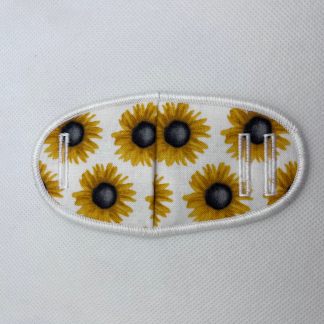 Eye patch, sunflowers, metal
