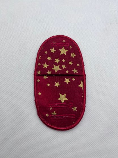 Eye patch, gold stars on red, metal