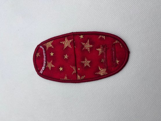 Eye patch, striped gold stars on red, plastic